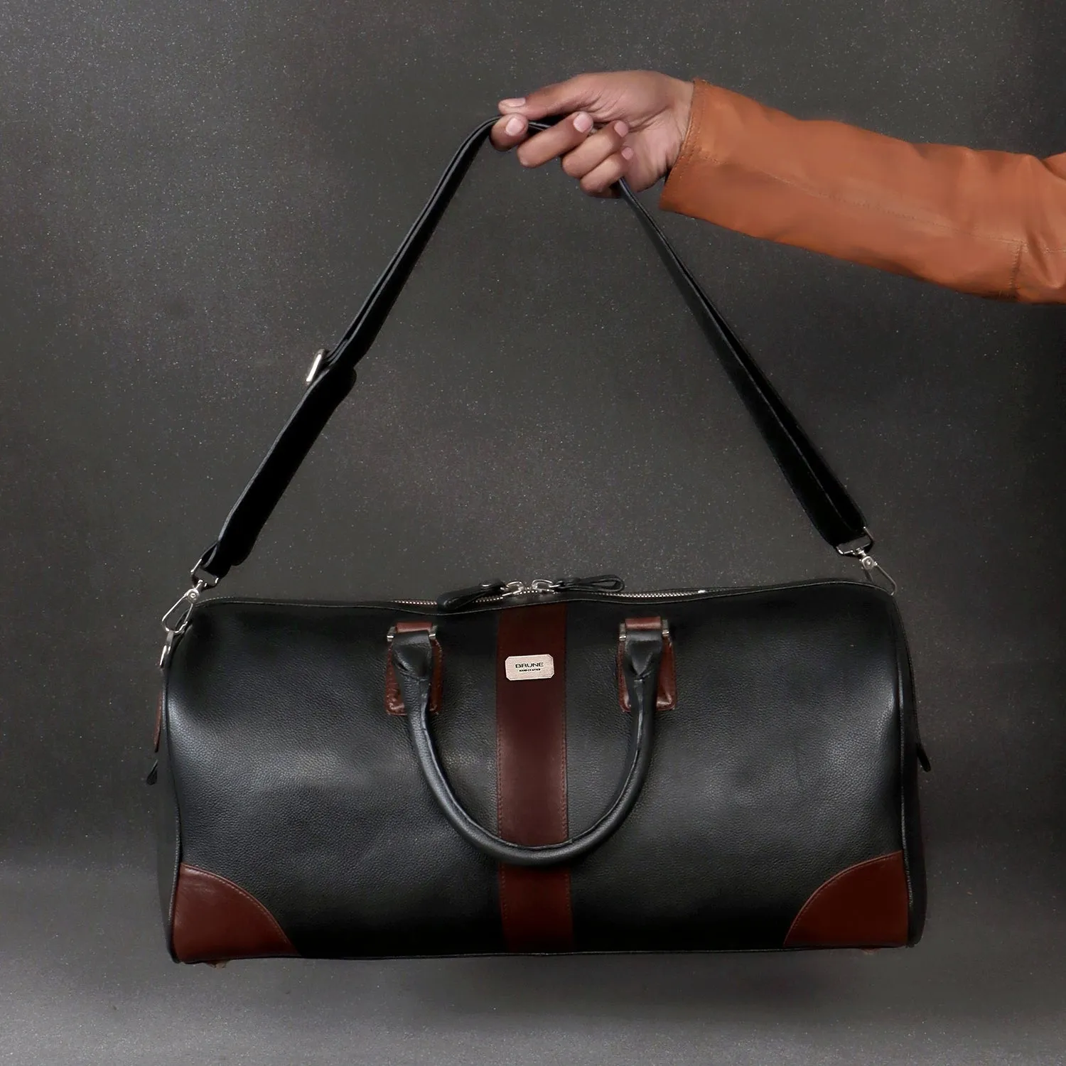 Contrasting Dark Brown Trims Black Textured Leather Duffle Bag With Removable Strap By Brune & Bareskin