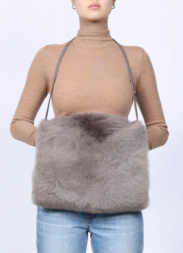 The Cozy Cashmere Shearling Muff Bag