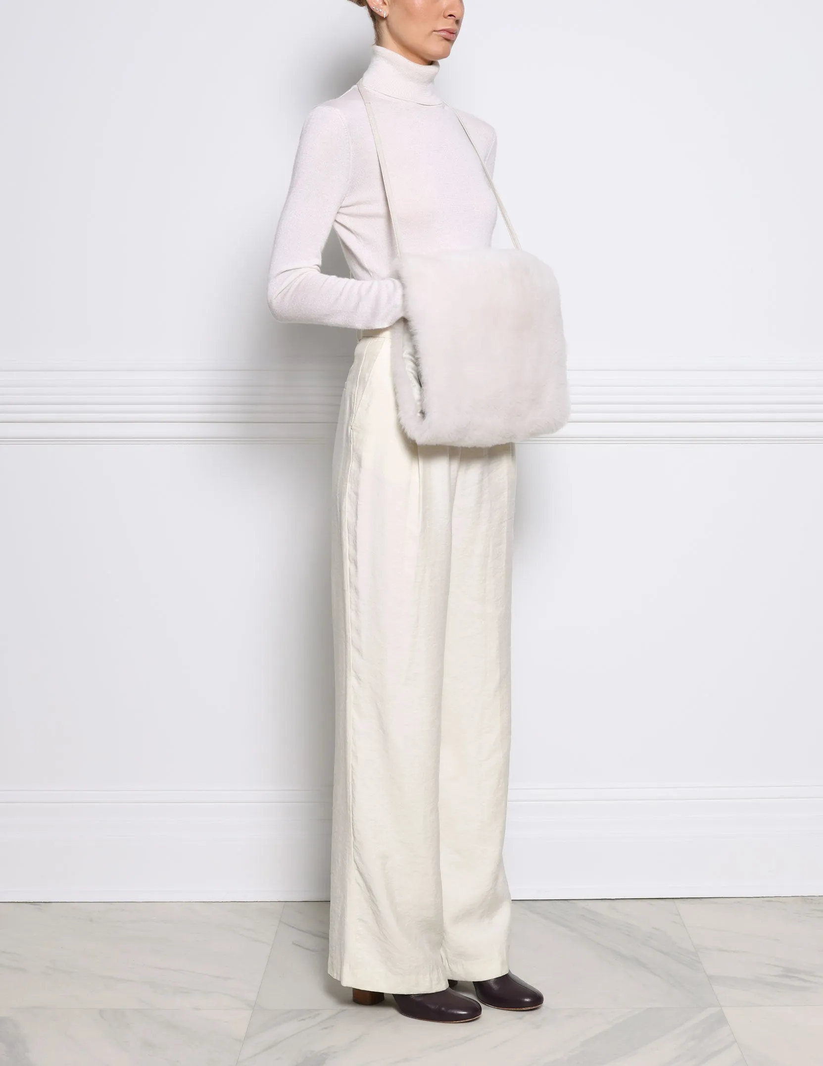 The Cozy Cashmere Shearling Muff Bag